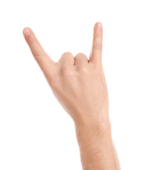 Wall Mural - Man showing rock gesture on white background, closeup of hand