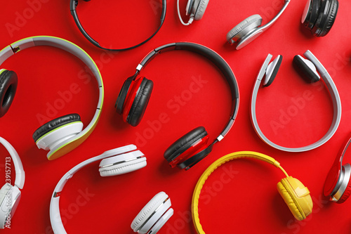 Many different headphones on color background, top view Poster Mural XXL