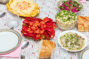 Canvas Print - Salads and side dishes in plates on the table