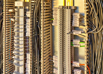 Wall Mural - Control panel with terminals and wires inside view