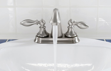 Brushed Nickel Faucet with Running Water 