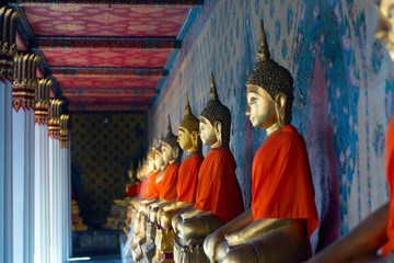 Wall Mural - Ancient buddha statue image inside Wat Arun temple in Bangkok, Thailand.