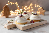 Fototapeta Na sufit - Pavlova Cake with berry cranberries on white background