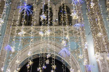 Wall Mural - Christmas and New Year holidays illumination on Nikolskaya Street near the Moscow Kremlin at night, Russia