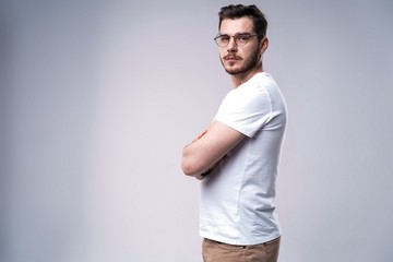 Handsome young guy posing in studio - isolated