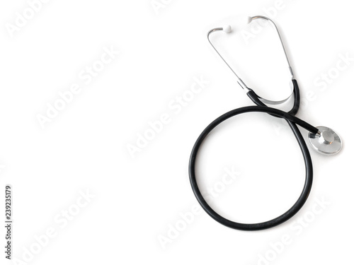 Fotografie, Obraz A doctors black flexible rubber and steel metal heart pulse stethoscope laying isolated on a white table top