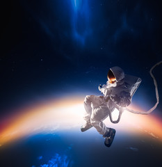 Wall Mural - astronaut exploring outer space