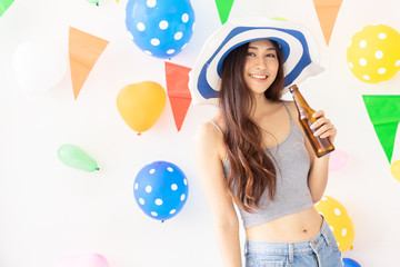 celebration new year or birthday party group of asian young woman and confetti happy,funny concept.drinking wine happy and fun in new year celebrate, color balloon  background.