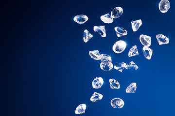 Shiny diamonds on a blue background