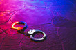 handcuffs on the floor at night
