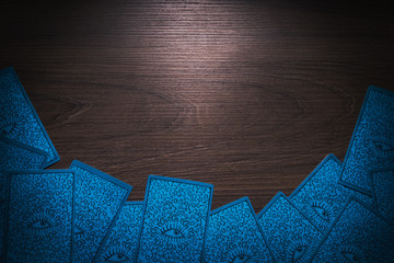 Tarot cards on a wooden background