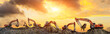 © ABCDstock - Many excavators work on construction site at sunset,panoramic view