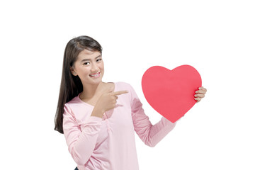 Wall Mural - Portrait of asian woman showing red heart shaped