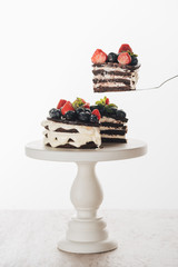 Wall Mural - gourmet homemade whoopie pie cake with fresh blueberries and strawberries