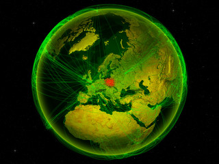 Poland from space on planet Earth with digital network representing international communication, technology and travel.