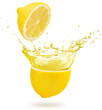 yellow juice exploding out of a lemon isolated on white background