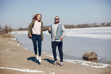 Wall Mural - Elegant couple in a winter park