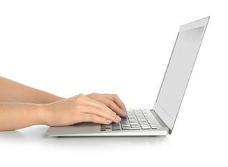 Woman using laptop on white background