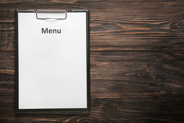 Blank menu on wooden table