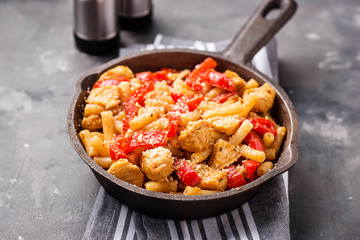 Wall Mural - Pasta with chicken and pepper in tomato sauce