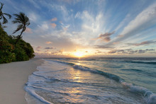 Sunrise Over The Indian Ocean From A Deserted Beach In The Northern Huvadhu Atoll, Maldives, Indian Ocean, Asia