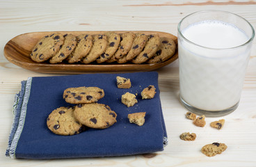 homemade chocolate cookies accompanied by a glass of vegetable milk