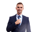 © Elena Kharichkina - business, people and office concept - happy smiling businessman in suit