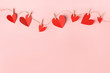 Leinwandbild Motiv Paper valentines day hearts on pink