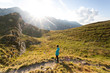 © Andrei - Girl hiking through Fagaras mountains in Romania.