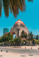 Wall Mural - Mexico city/ May, 29, 2018: Long shot of a famous landmark in the street on blue sky