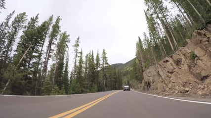Sticker - Driving on paved road in Rocky Mountain National Park.
