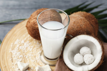 Composition with tasty coconut water on table