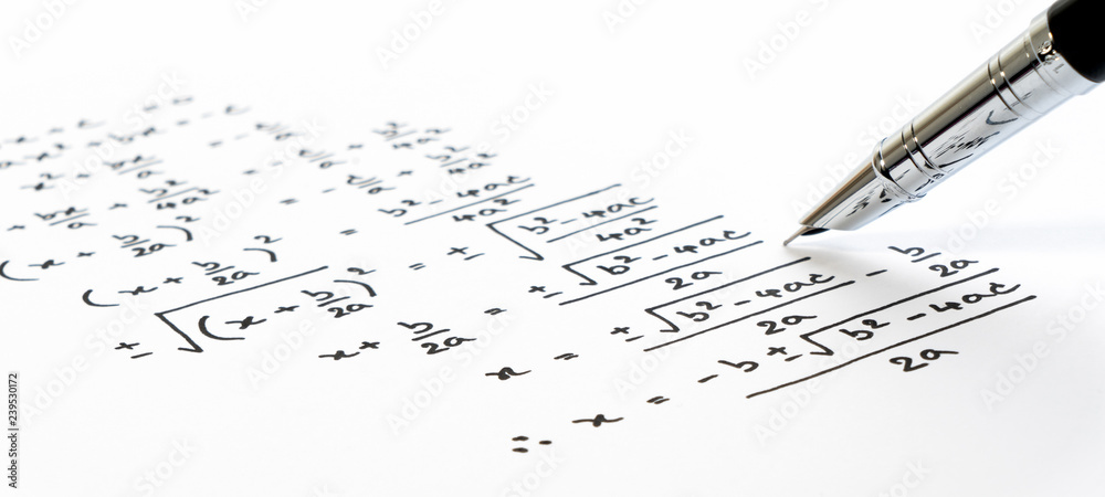 Handwriting of mathematics quadratic equation formula on examination ...