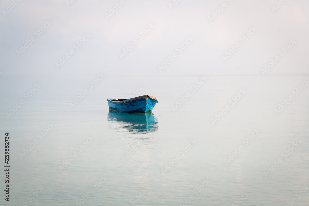 Blue boat on the sea in Koh Rong Samloem, Cambodia - obrazy, fototapety, plakaty 
