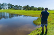 © Thiago Santos - Young man practicing sport fishing in weir, fishing catch e rele
