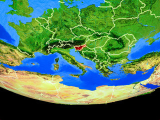  Slovenia from space on model of planet Earth with country borders.
