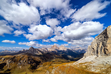 Wall Mural - Colorful scenic view of majestic Dolomites mountains in Italian Alps. Landscape photo of colorful trees and rocky mountains in the the Italian Dolomites during autumn time.
