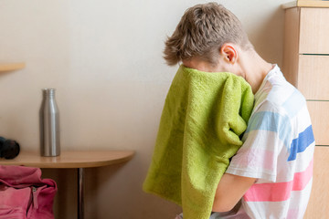 tired sportsman athlete sitting with towel and relax f