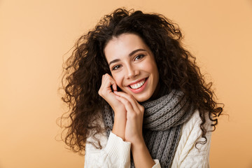 Sticker - Cheerful young woman wearing winter scarf