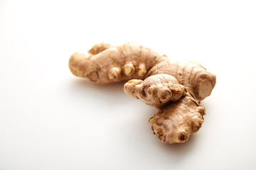 fresh ginger on white background