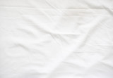 Fototapeta  - Wrinkle on white bed sheet