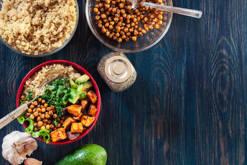 Colorful buddha bowl with quinoa and roasted and fresh vegetables