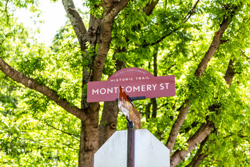 Montgomery, USA historic street road sign closeup during day in capital Alabama city in downtown old town historic text trail