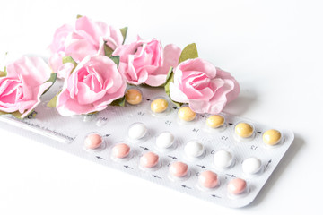 concept of female contraception on white background