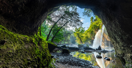 Haew Suwat Waterfall Khao Yai National Park, Nakhon Ratchasima, Thailand Waterfall view from the inside of the cave. Seeing is a beautiful rainbow