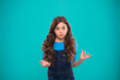 What are you talking about. Kid stunned bewildered emotion can not believe her eyes. Girl curly hairstyle wondering. Child bewildered stunned face blue background. Kid girl long curly hair stunned