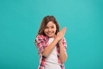 Little child smile excited with new idea stand over blue background. This is the point. Idea solution. Girl cute cheerful face found out important idea. Little girl long hair got bright idea