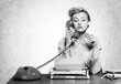© BillionPhotos.com - Attractive young woman speaking on  vintage phone