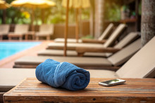 Holiday Week End , Relax Concept,towel And Smarthphone On Wooden Table Near  Bench Pool Villa Beach Side - Image