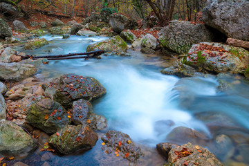 Wall Mural - Mountain fast river with cold water, beautiful big stones, amazing landscape